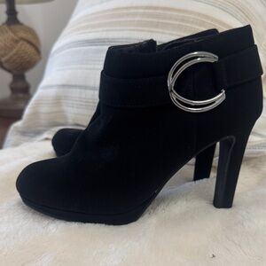 Black heels booties, slightly used, black and silver buckle on the side.